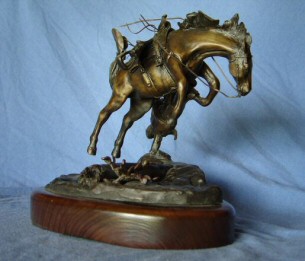 bronze sculpture "UPSET" from the side